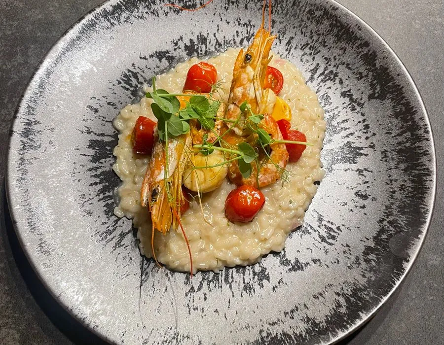 Seafood risotto with cherry tomatoes
